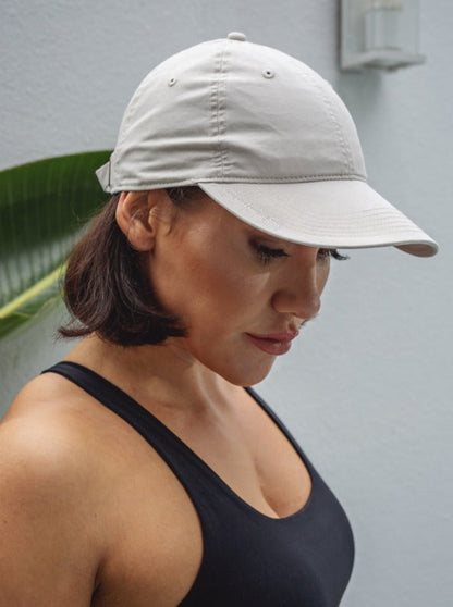 SHE IS. Cap